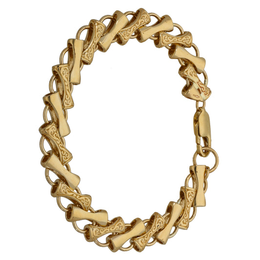Ornate 9ct gold fancy bracelet with carved link panels and chain clasp