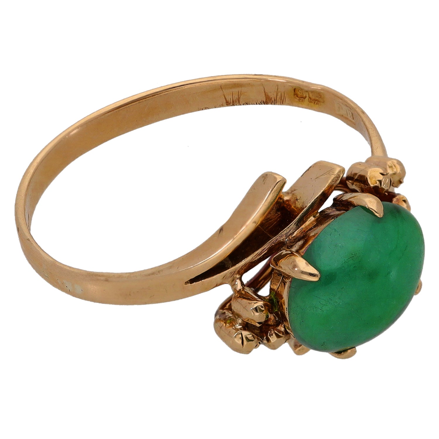 Gold jade single-stone ring with oval green gemstone and decorative prongs