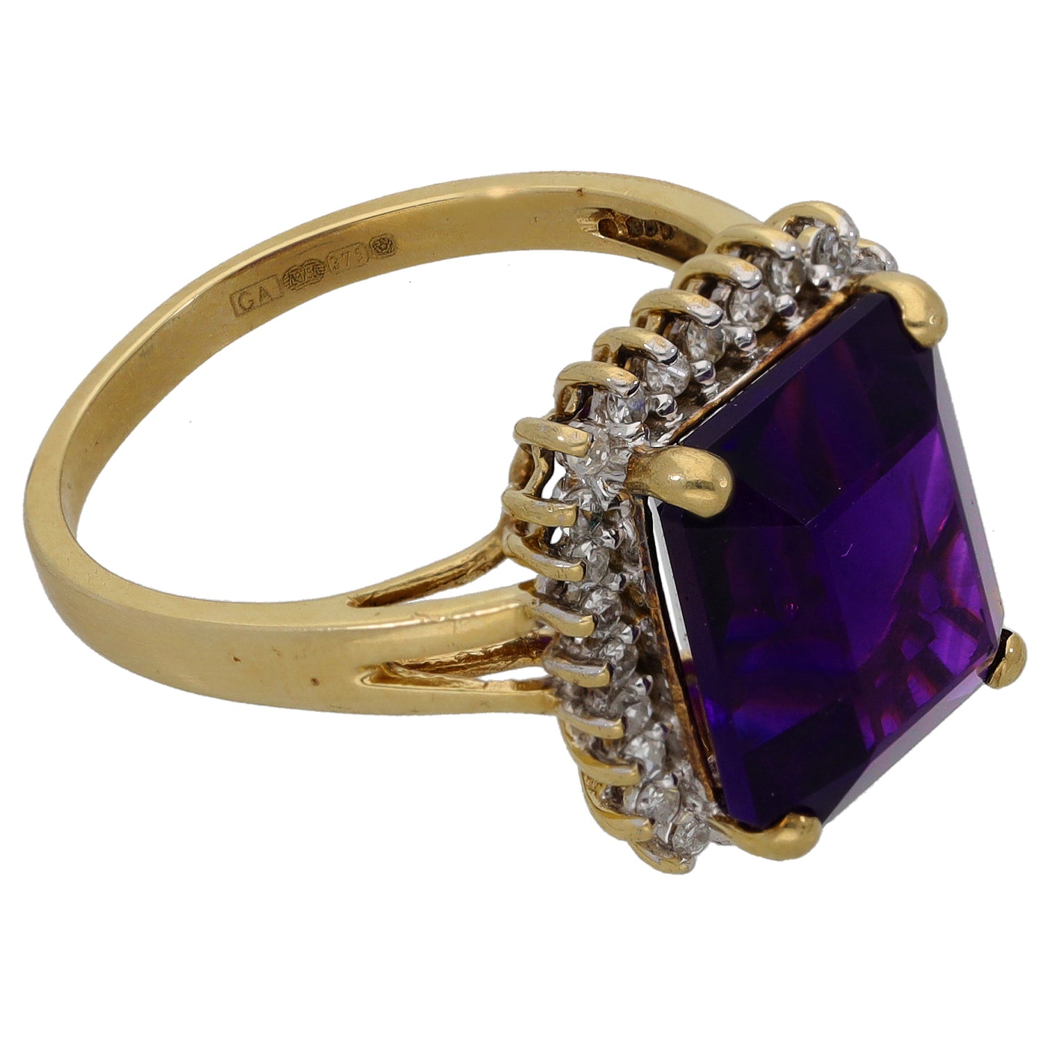 9ct gold ring featuring a raised square amethyst and diamond side clusters