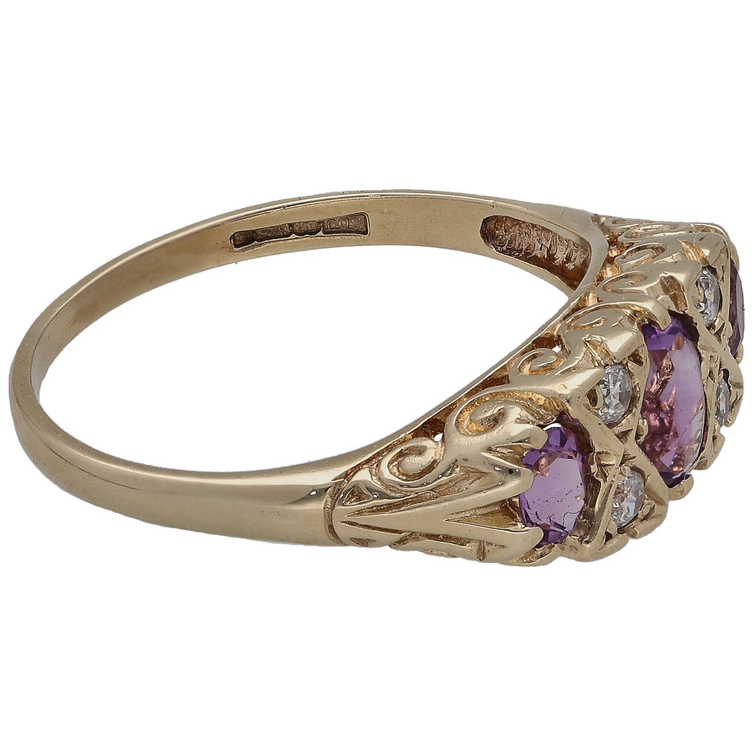 Gold cocktail ring side view with purple amethyst cluster and round CZ sparkle