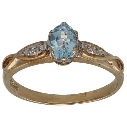9ct gold ring with oval blue gemstone center and small round diamond accents