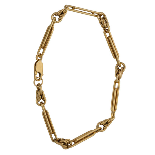 Gold-tone link bracelet with alternating rectangular bar and oval chain segments