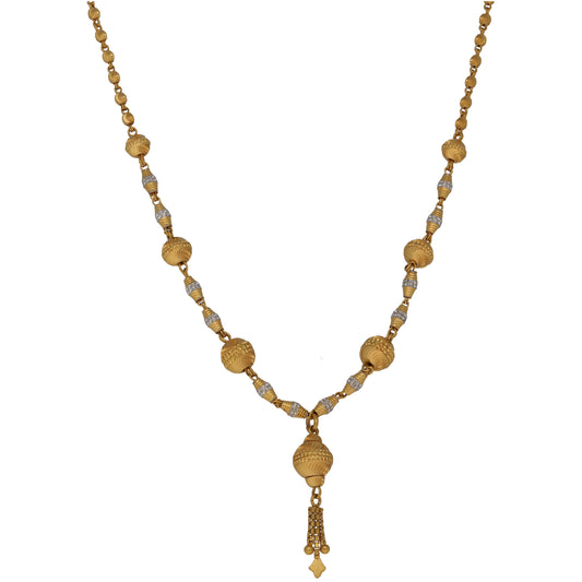 Gold-tone fancy necklace with textured round beads, stone-like links, and small tassel