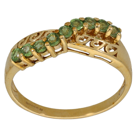 9ct gold half-eternity ring with green gemstones, ornate openwork setting
