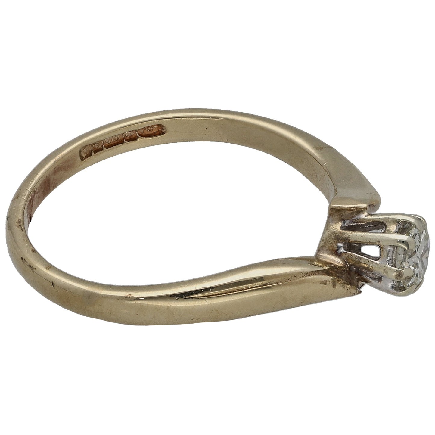 Gold solitaire ring with round diamond, engraved inner band and four prongs