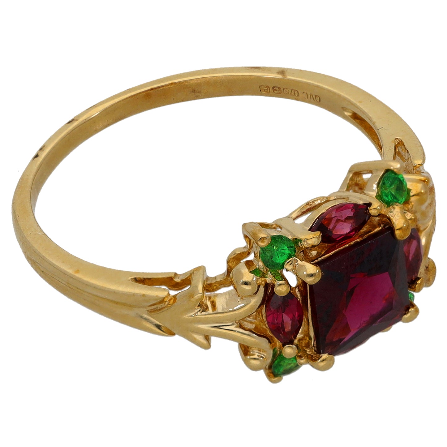 Gold cocktail ring with marquise red center stone, green accents, side view, size T