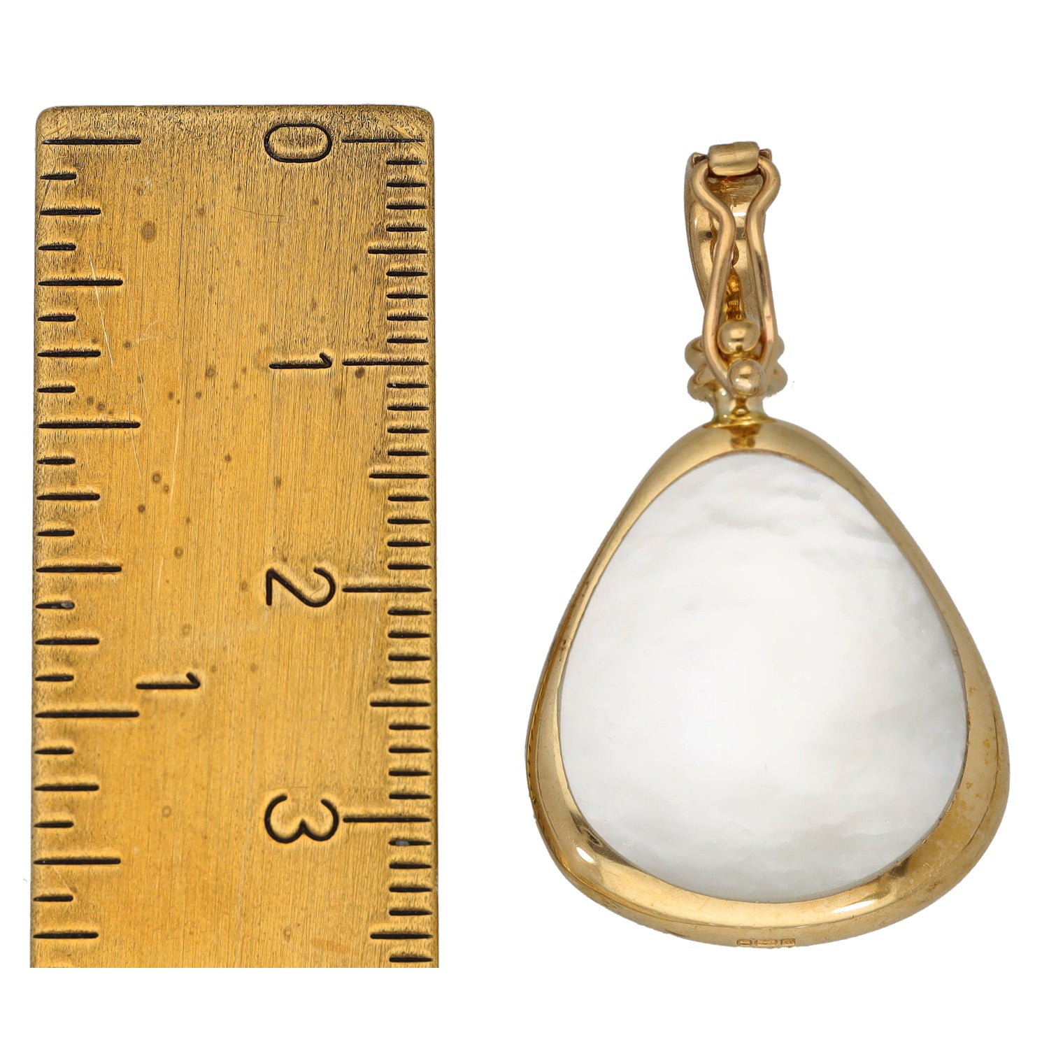 Gold teardrop pendant with mother-of-pearl center and ornate loop bail
