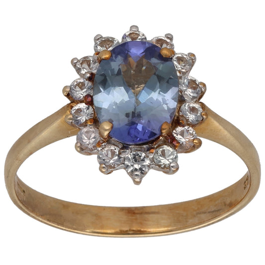 9ct gold ring with oval blue stone and clear crystal accents in a halo setting