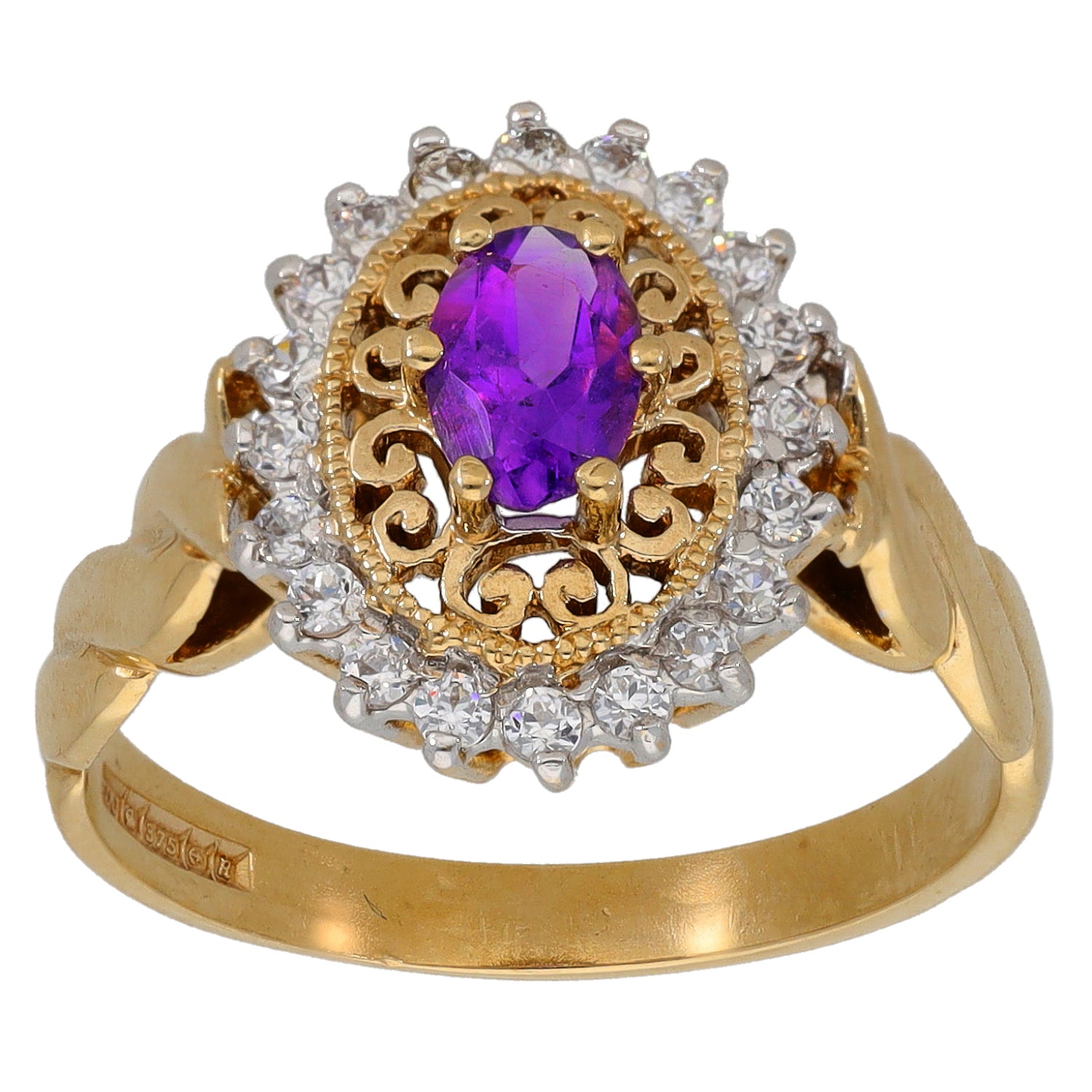 Gold cocktail ring featuring oval purple amethyst with ornate gold frame and CZ halo