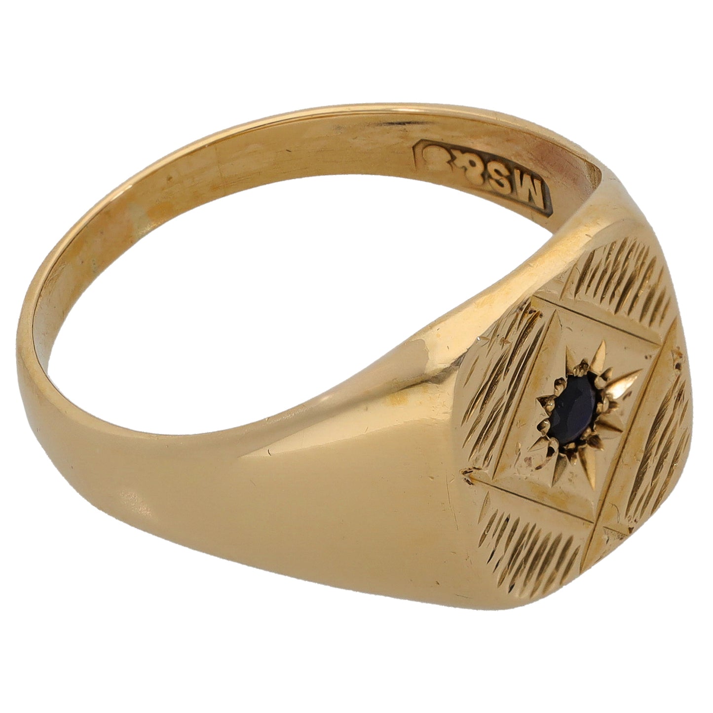 9ct gold signet ring with engraved pattern and dark sapphire centerpiece