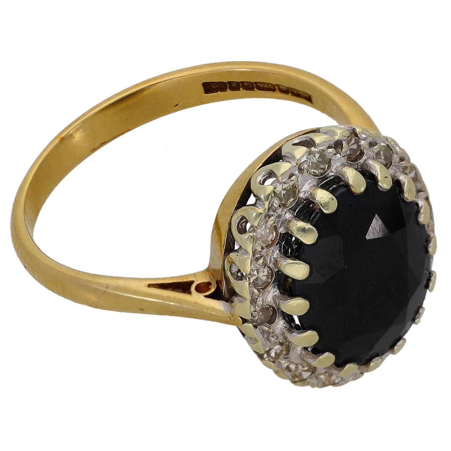 9ct gold cocktail ring with dark round gemstone and diamond halo
