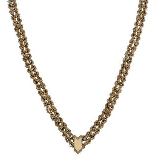 Gold chain necklace with chunky twisted links and V-shaped clasp charm pendant