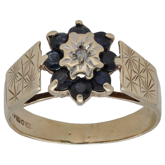 9ct gold sapphire and diamond dress ring with dark blue cluster and star center