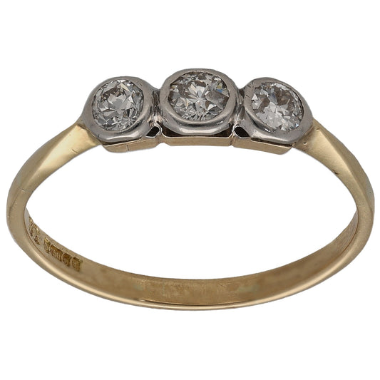 18k yellow gold three-stone ring with three round diamonds in claw settings