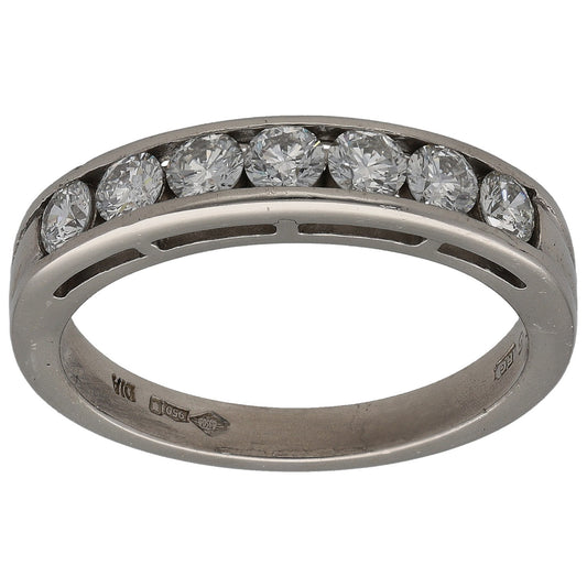 Platinum half eternity ring with round diamonds along the top edge