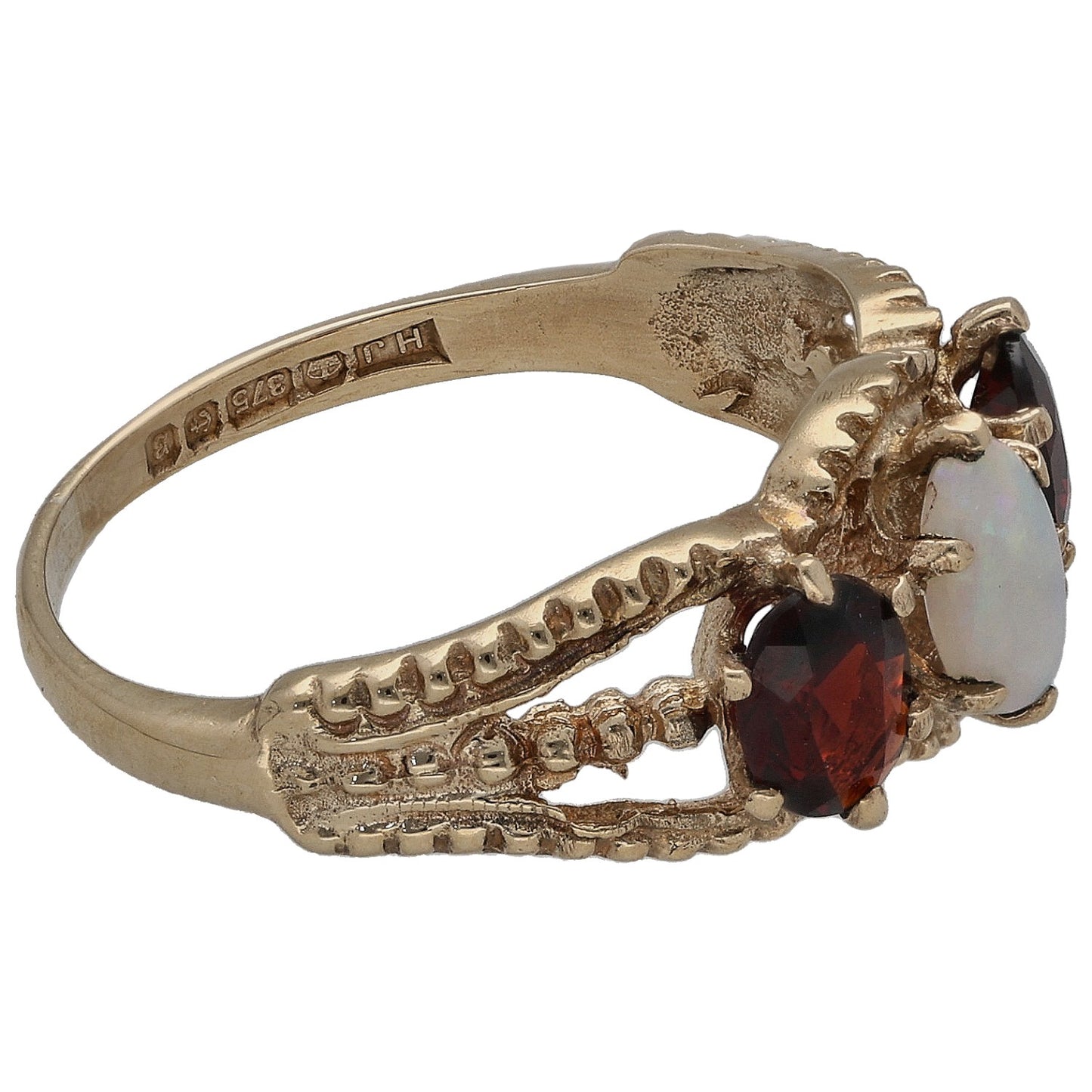9ct gold opal and garnet ring, side view with dark red accent stones