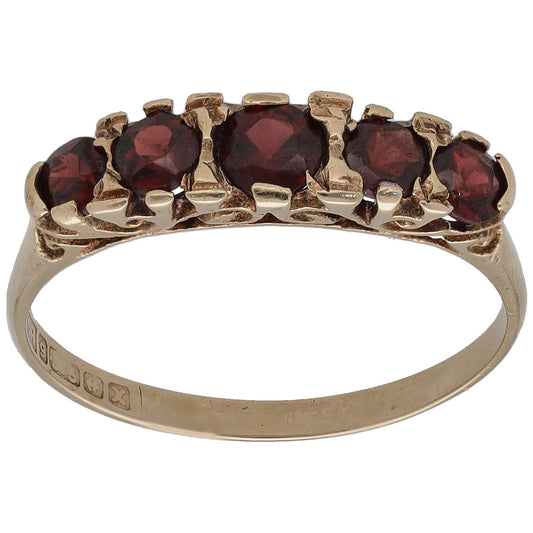 9ct gold garnet cocktail ring with five dark red stones in prong setting