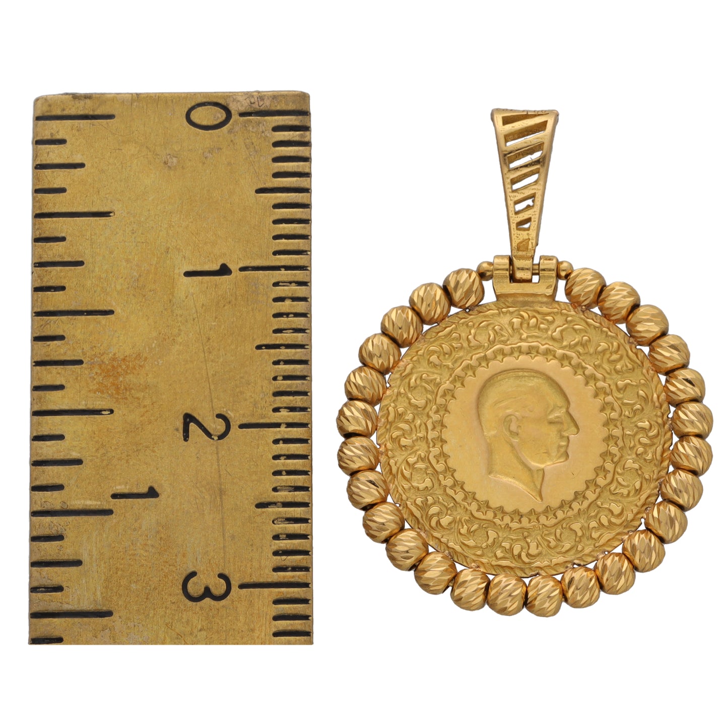 Gold-tone round pendant front with profile medallion, beaded rim, and top loop bail