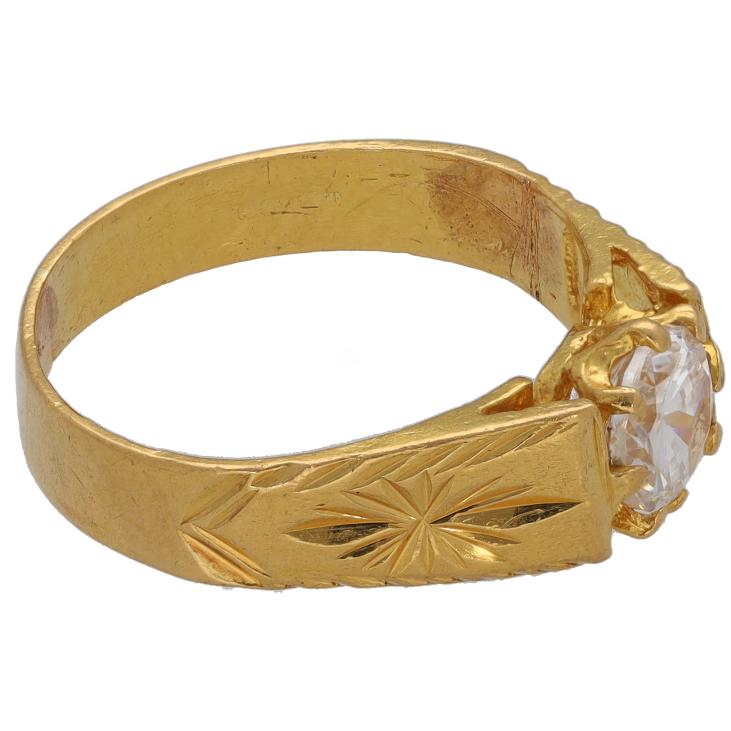 Gold tone CZ single-stone ring with round clear stone and carved leaf pattern band