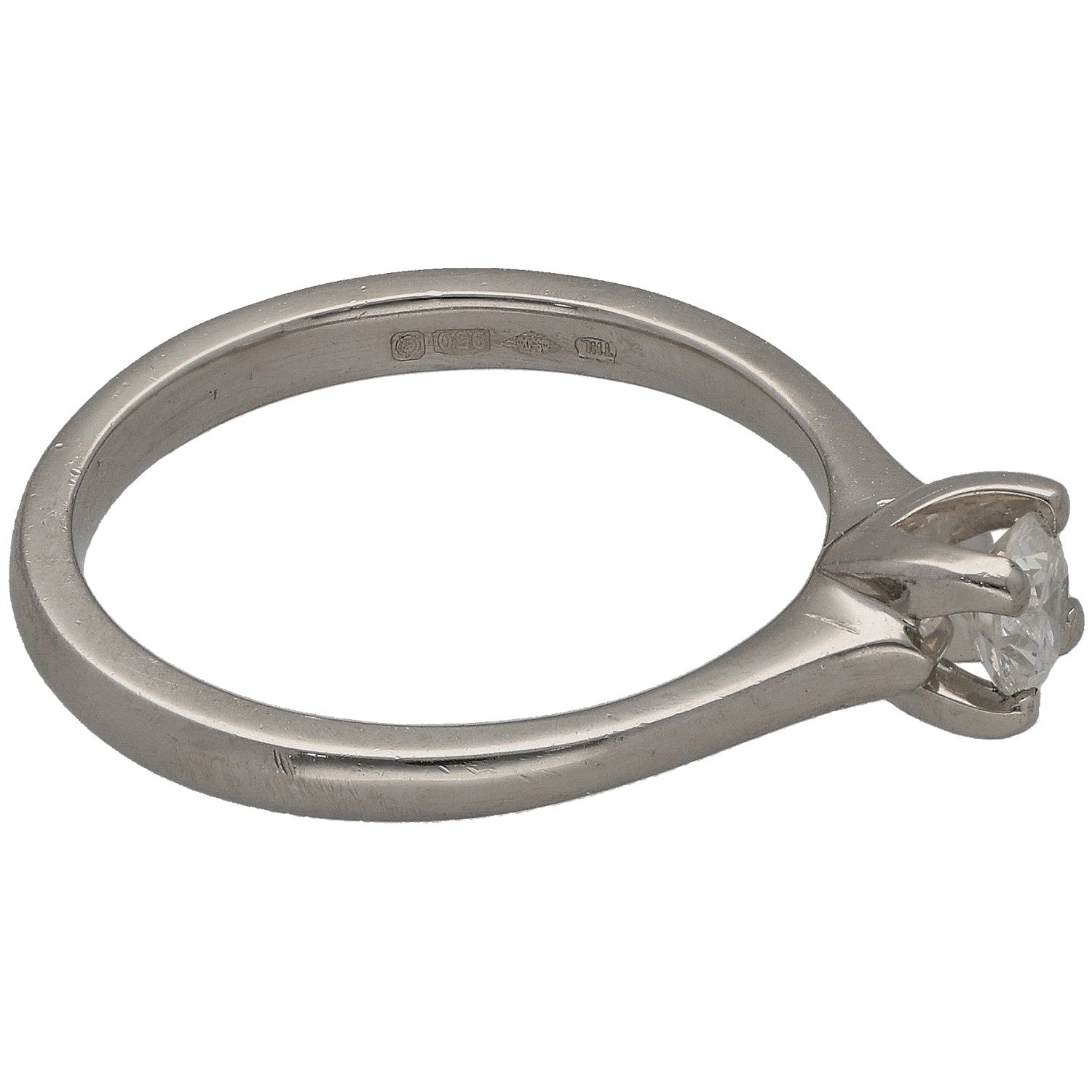 Platinum round diamond solitaire ring, side view with four-prong center stone