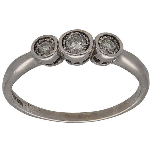 White gold three-stone ring with three round diamonds in bezel settings