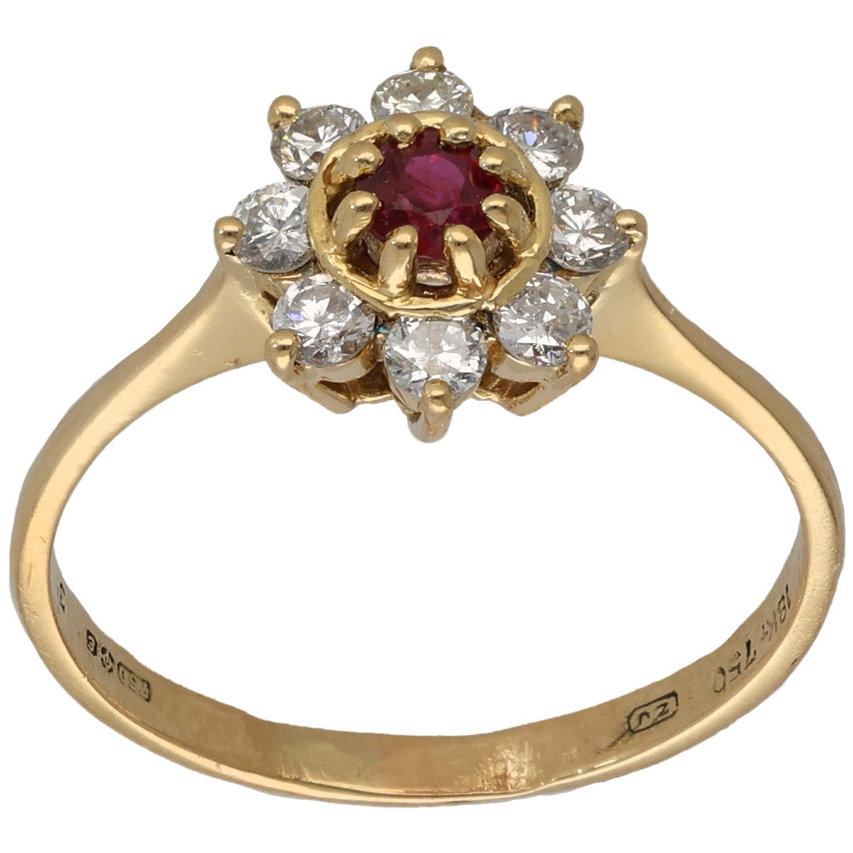 Gold cocktail ring with round ruby center and round diamond halo, prong-set