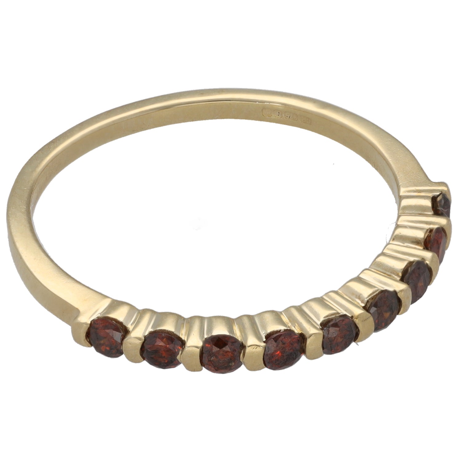 9ct gold half-eternity ring side view with round dark red stones along raised band