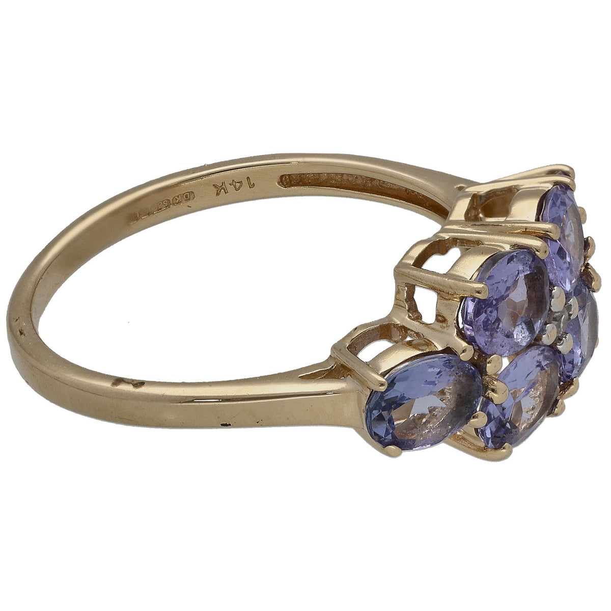 14k gold ring side view with prong-set oval tanzanite stones