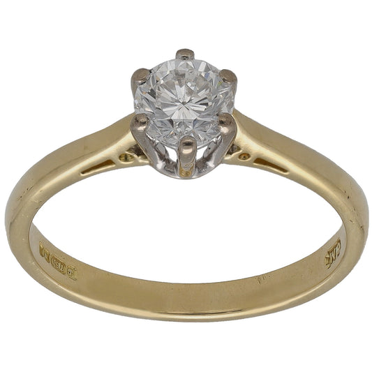 Yellow gold solitaire ring with round diamond center and four claw prongs