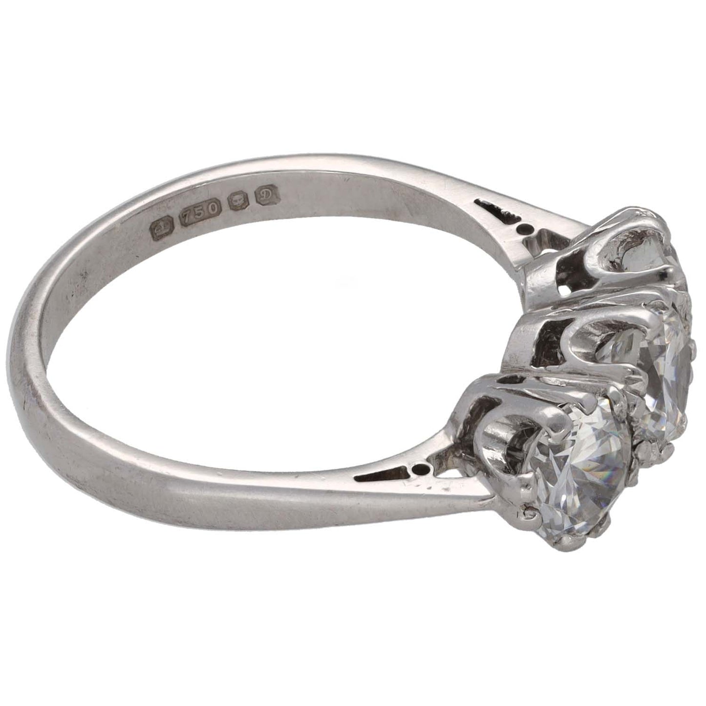 Three-stone CZ ring side view: white gold tone band with round clear stones