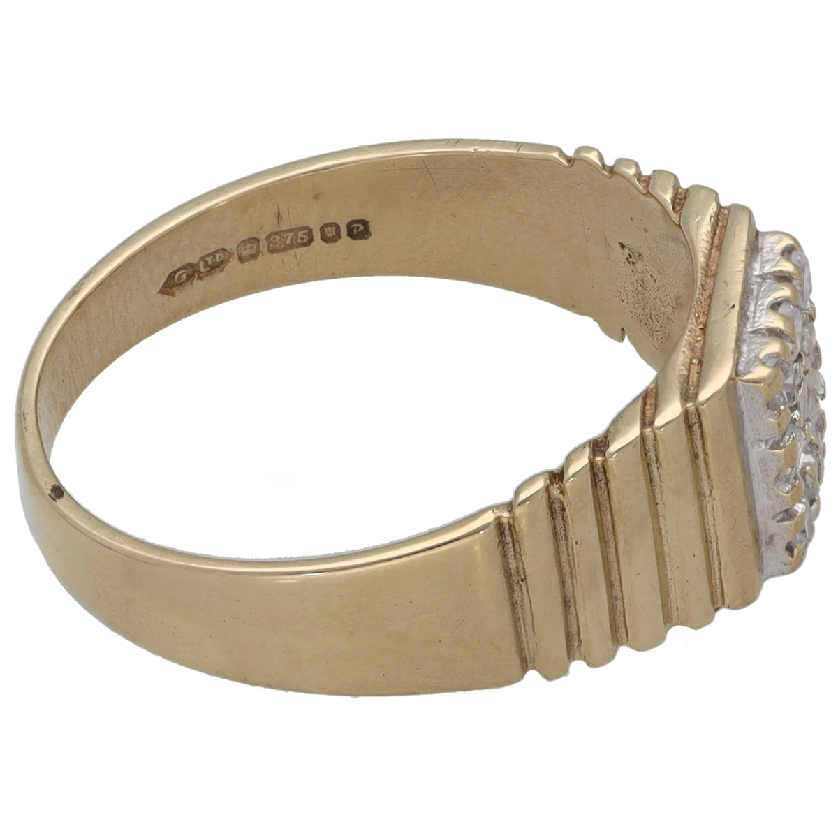Gold tone signet-style ring with side ridges and round crystal CZ accents; hallmarks inside