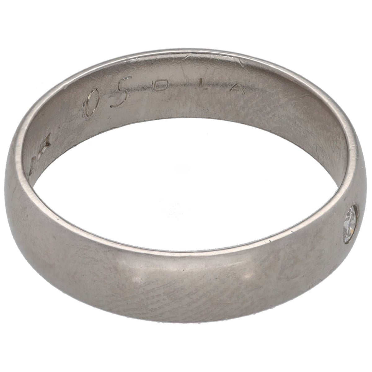 Platinum plain wedding band with engraved inside markings