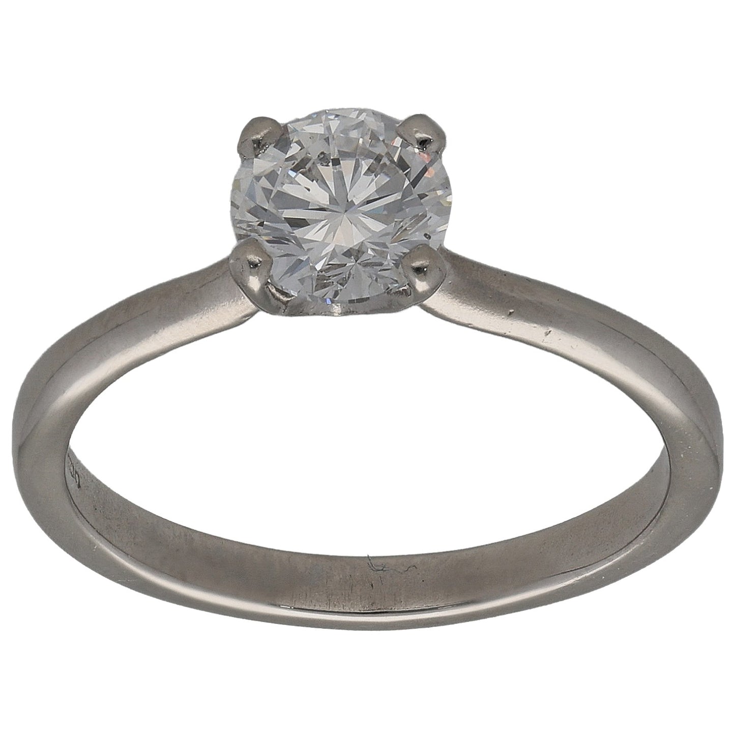 Platinum round diamond solitaire ring, bezel-set center stone on slim band