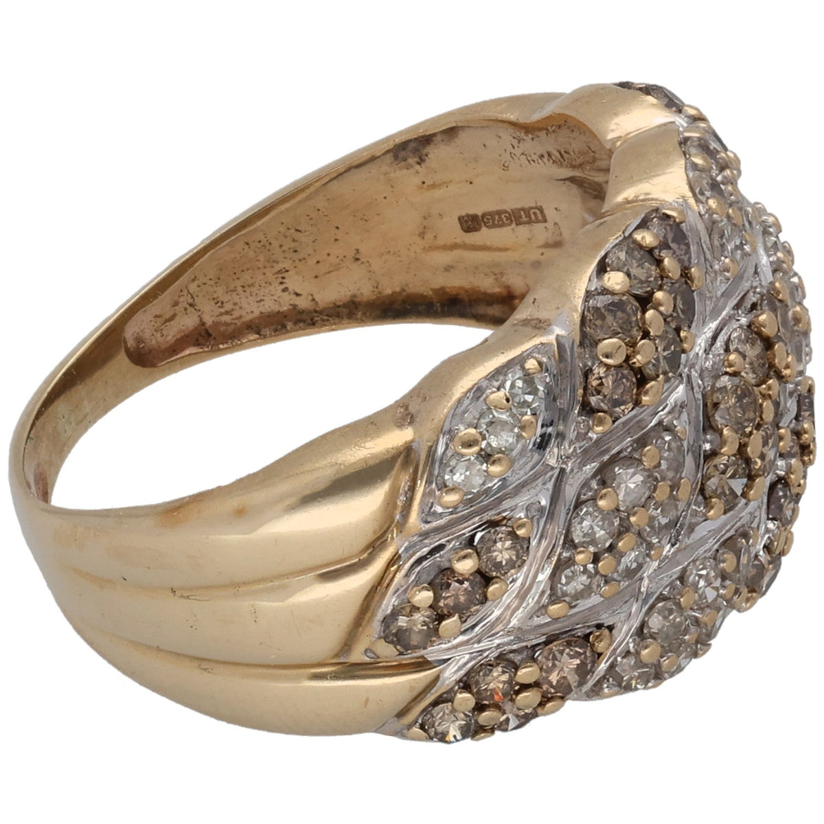 Two-tone gold ring side view with wave diamond pave setting