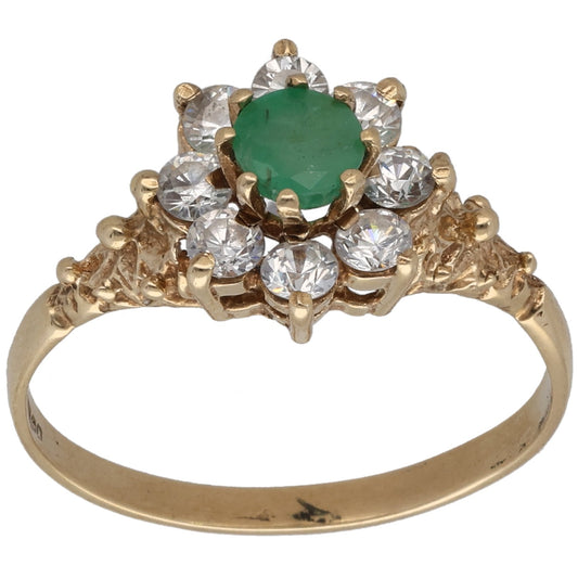 9ct gold cocktail ring with oval green emerald center and round CZ halo
