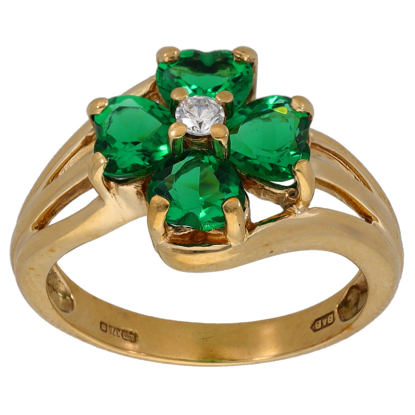 Gold-tone cocktail ring with emerald-green stones and a clear center stone, size M