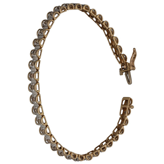 Bicolour gold tennis bracelet with oval links and round diamond accents, hinged clasp