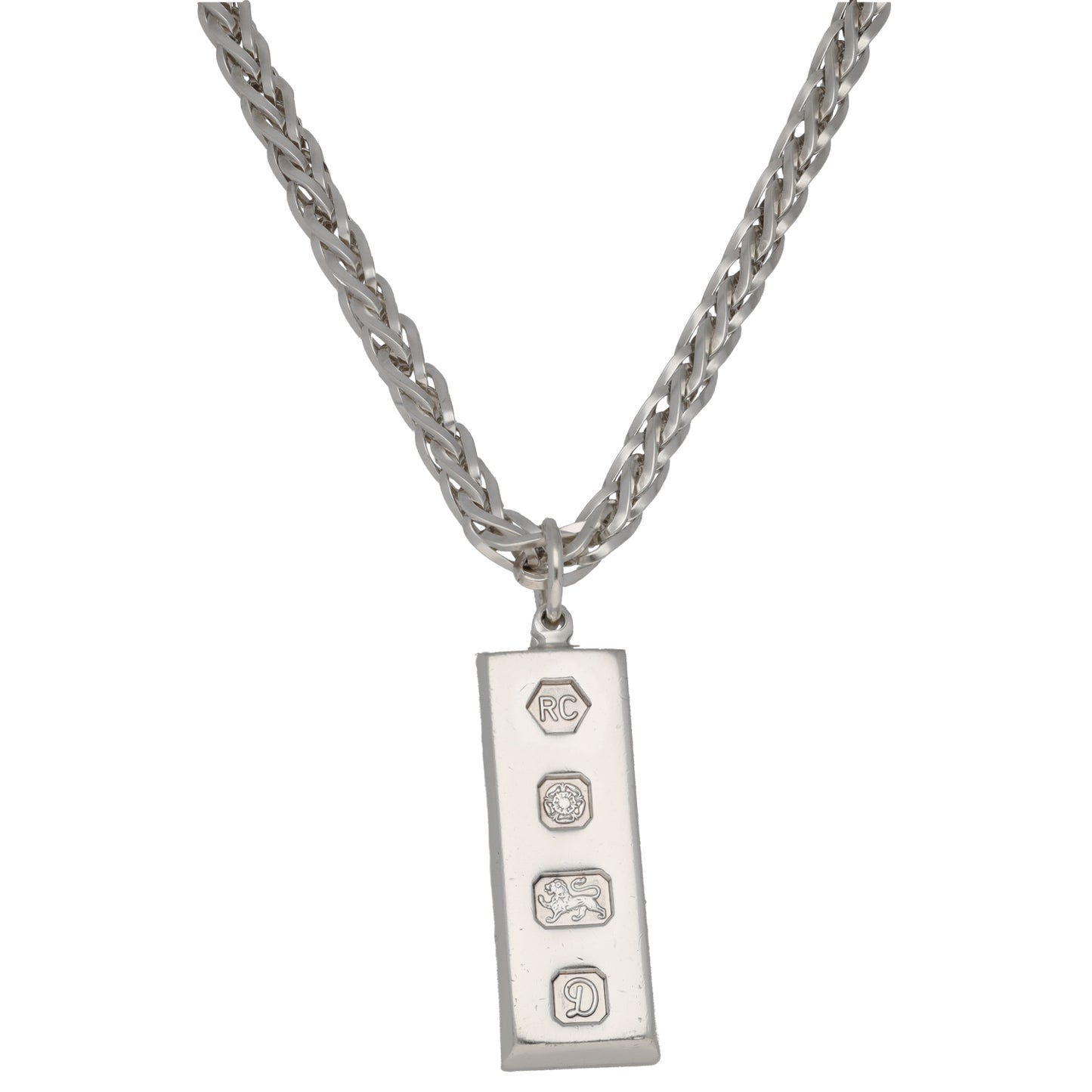 Sterling silver ingot pendant with small engraved symbols, on link chain