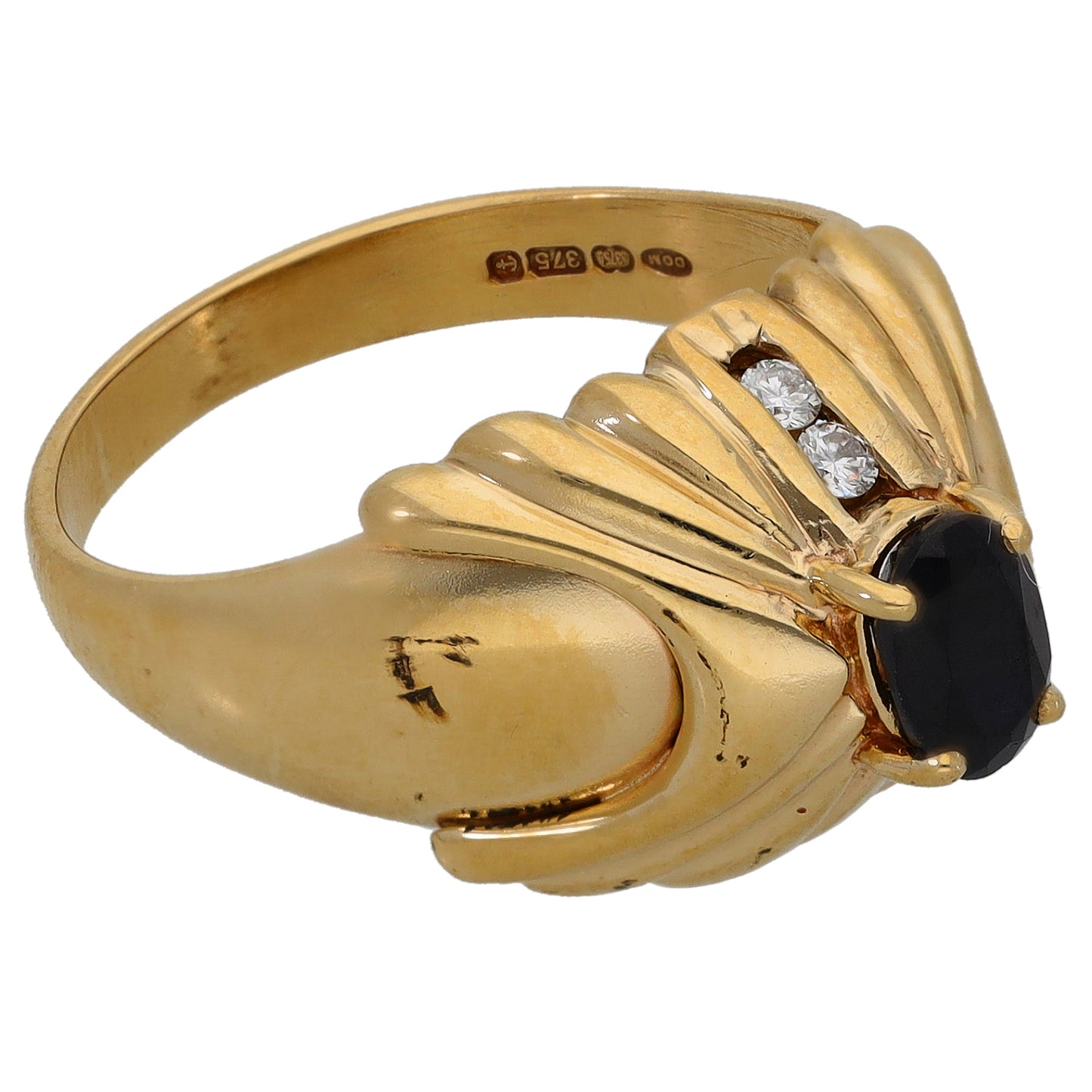 9ct gold ring with oval dark sapphire center and round diamond accents on band