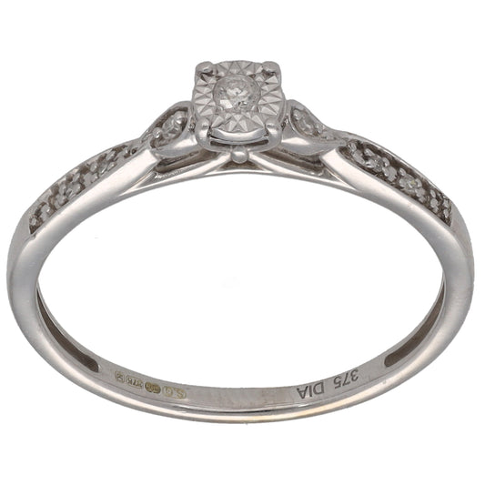 9ct white gold solitaire ring with round center diamond and small side diamonds