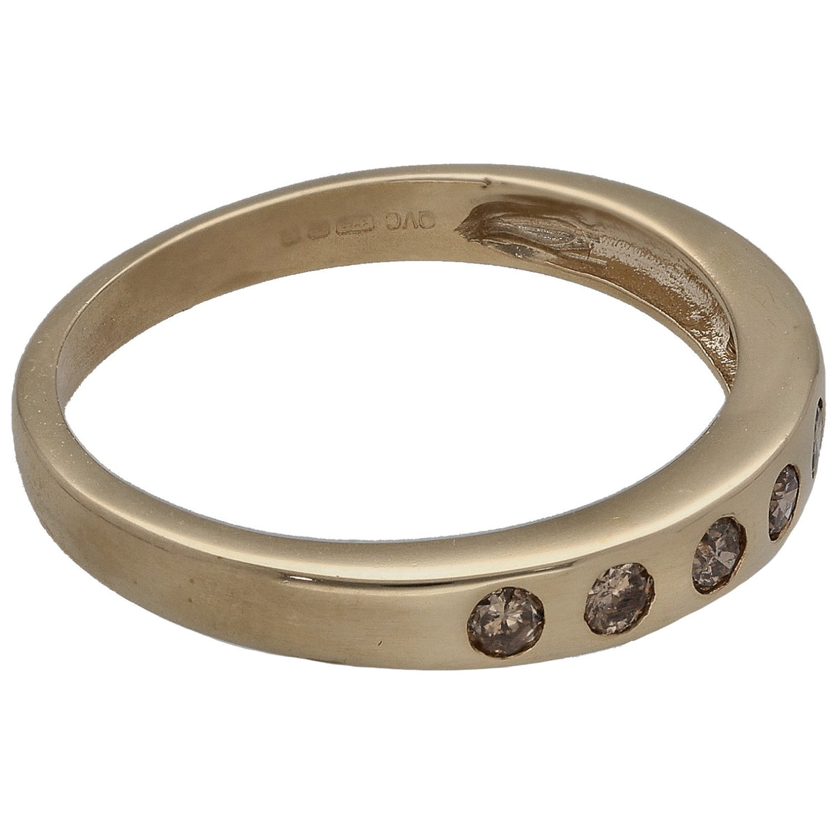9ct gold half eternity ring side view, round dark diamonds set on the band