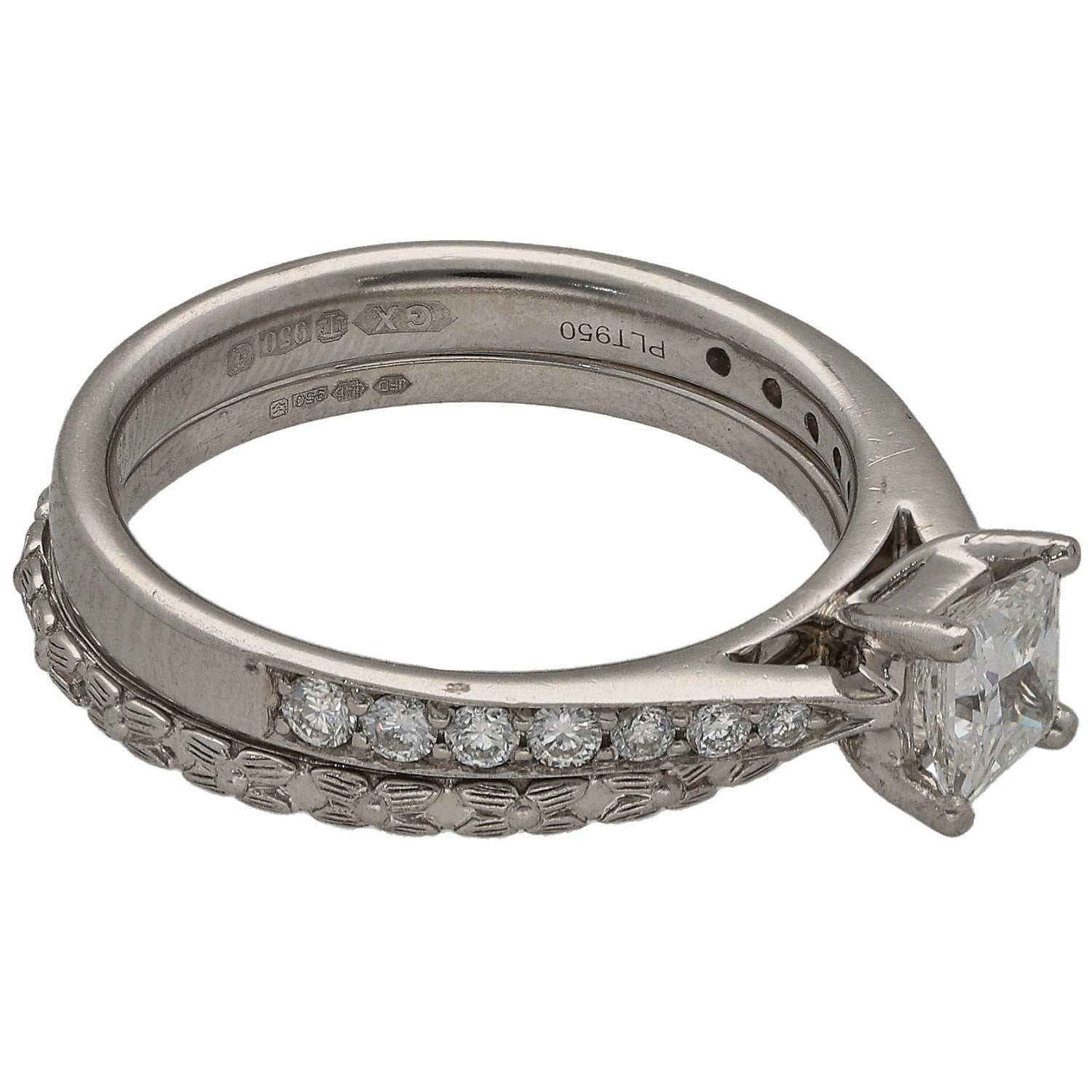 Platinum diamond ring set with square center stone and pavé band