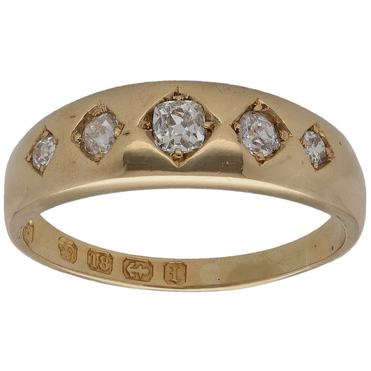 Gold diamond cluster ring with five round stones in Victorian-style settings
