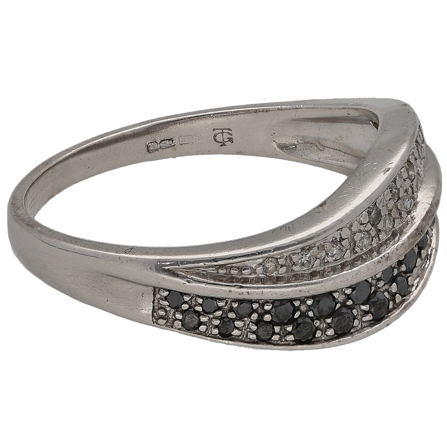 White gold half eternity ring with black and clear round diamonds, side view