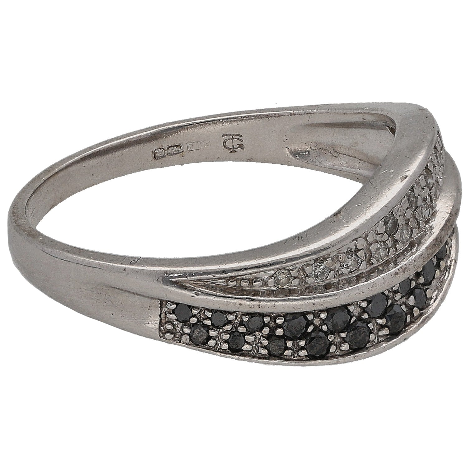 White gold half eternity ring with black and clear round diamonds, side view