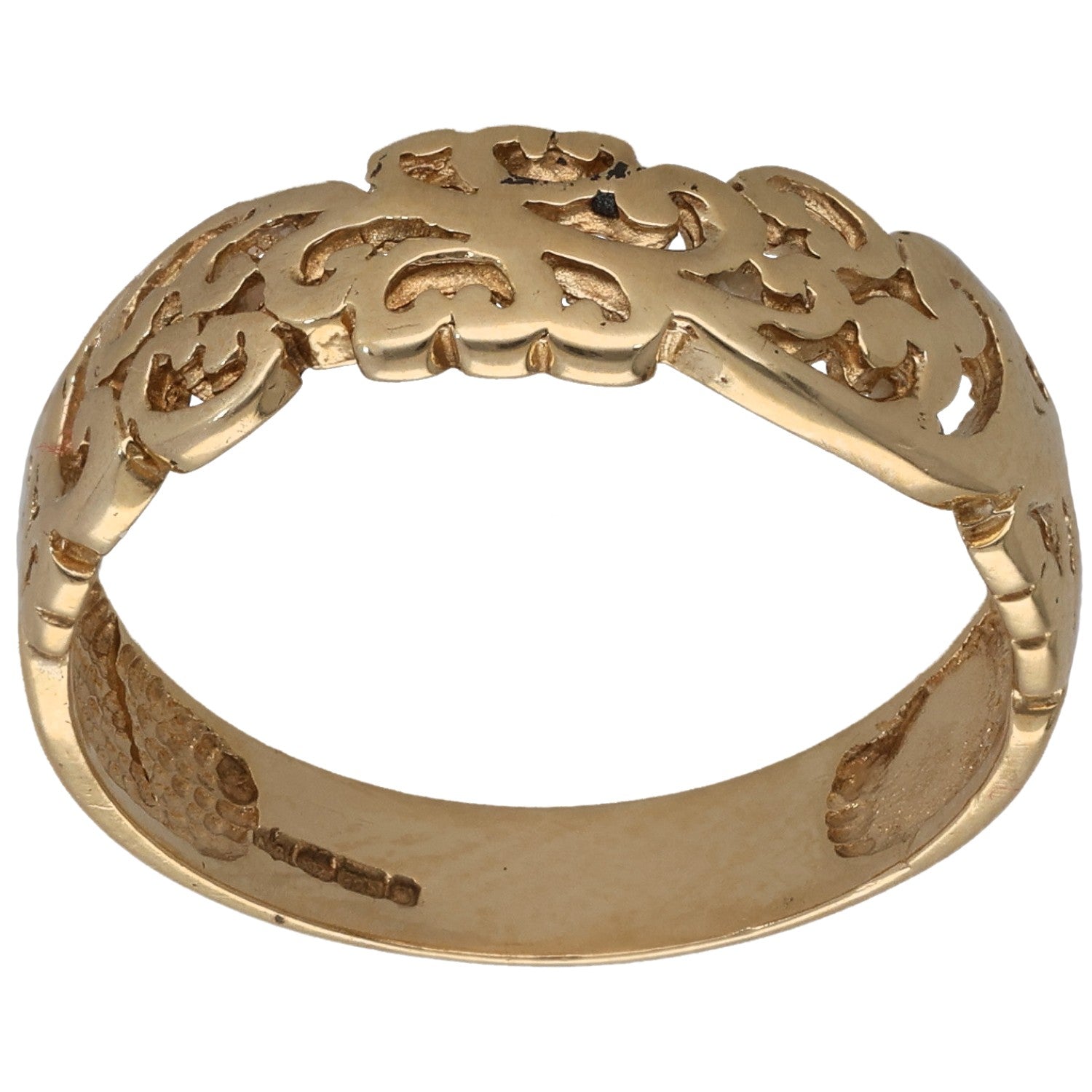 9ct gold wedding ring with engraved sculpted motifs around the band