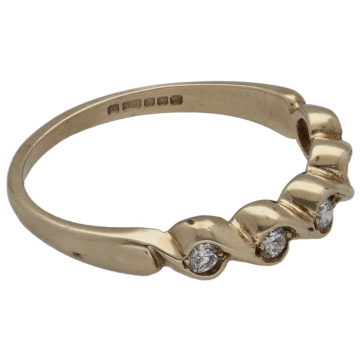 Gold half eternity ring, inside hallmarks and three round diamond points on curved band