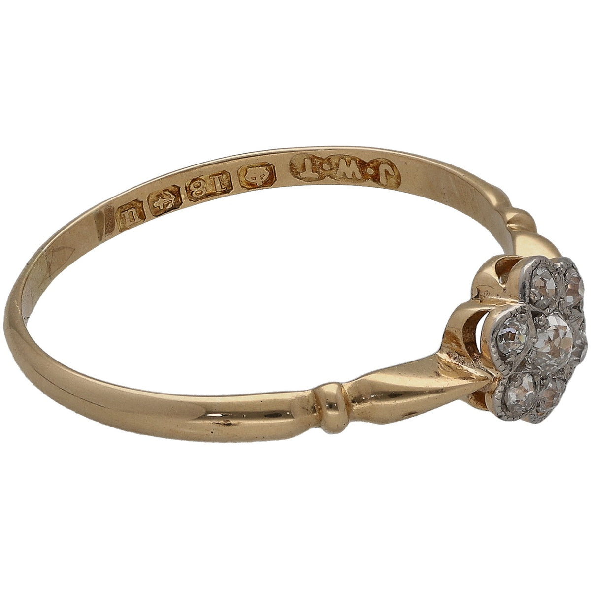 Gold old-mine diamond cluster ring, engraved band and side view of three diamonds