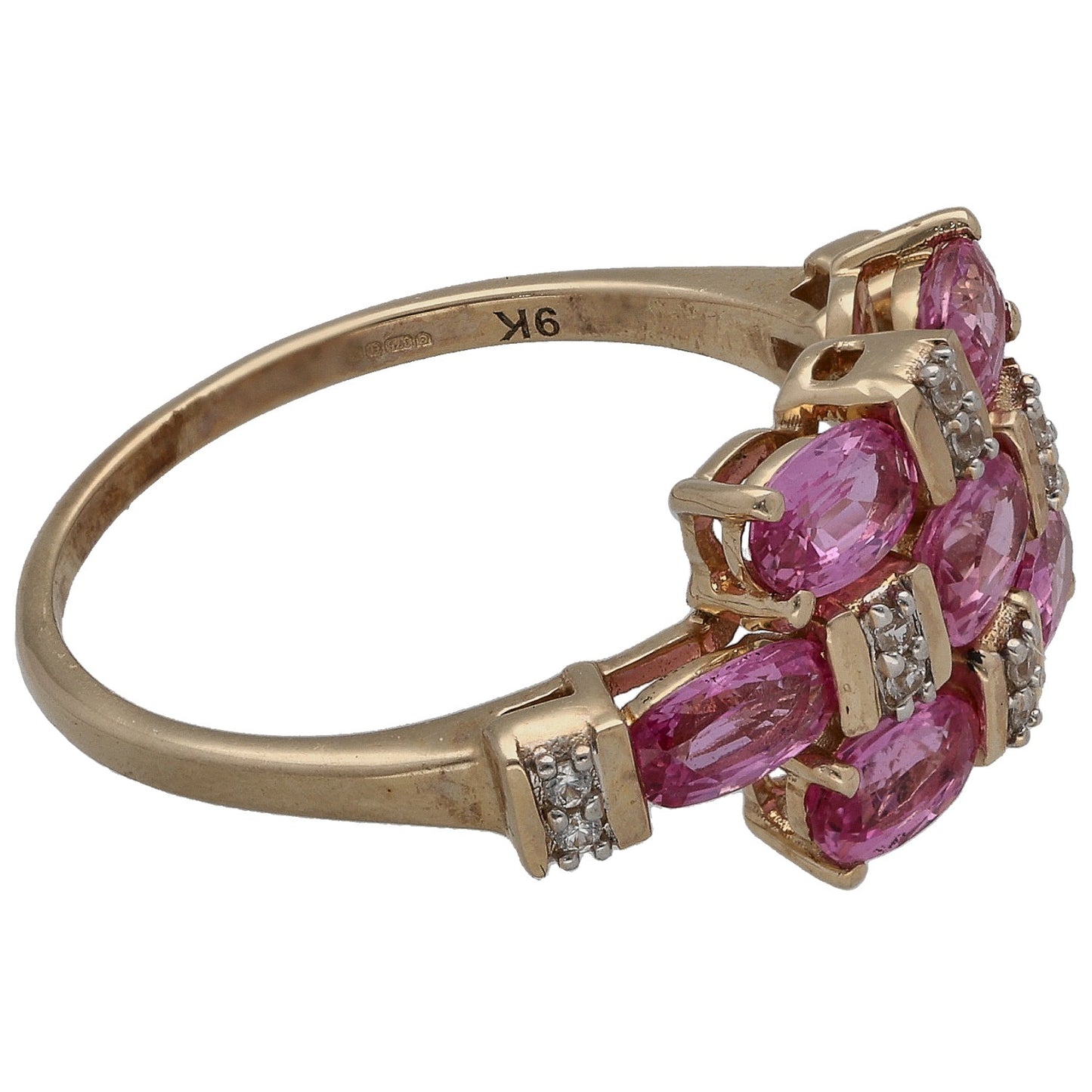 9ct gold side view cocktail ring with pink oval stones and small clear accents