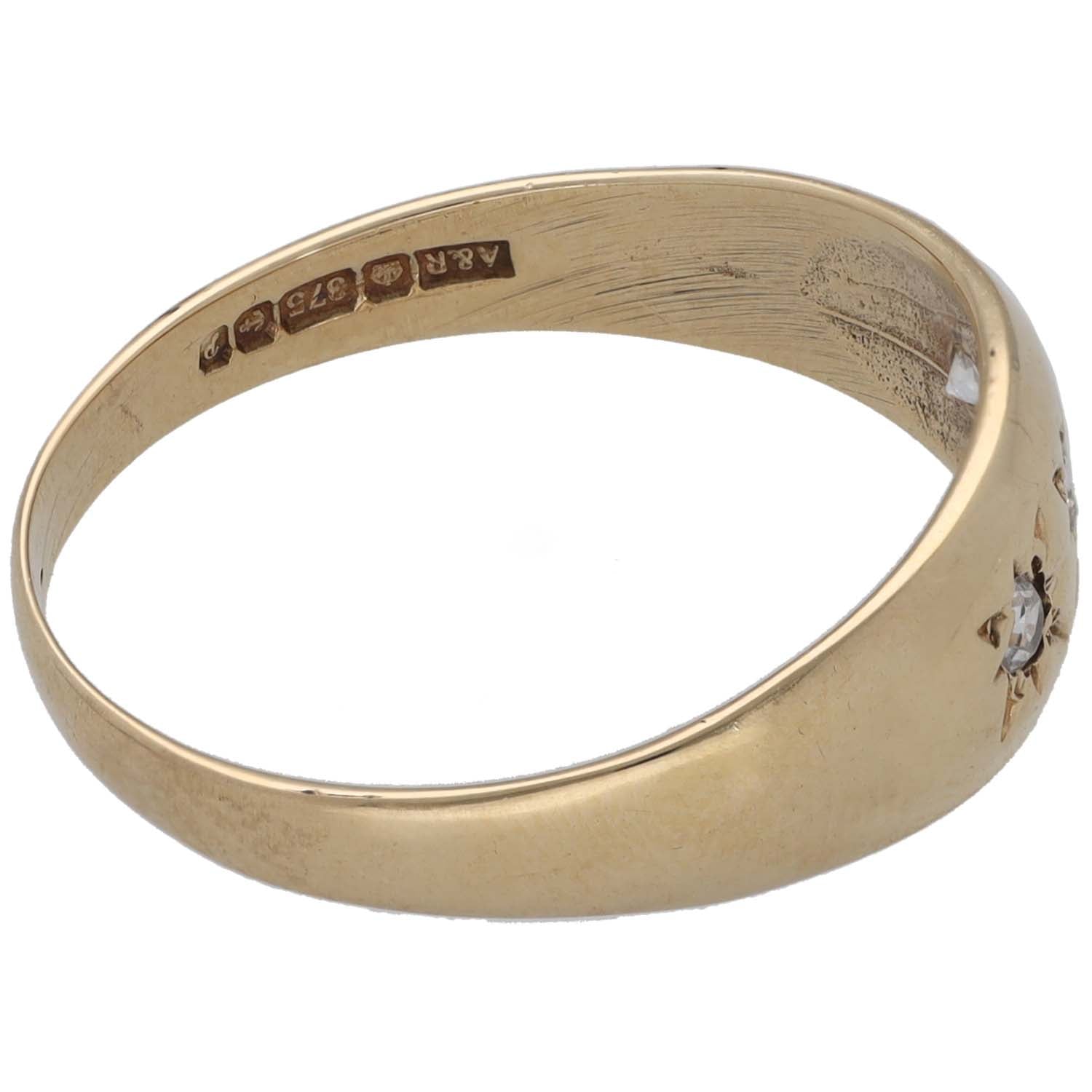 9ct gold three-stone CZ ring band, engraved inside and side star-set stones